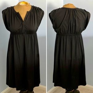Limited empire waist dress with gathered shoulders